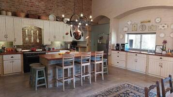 Deluxe House, Garden View | Private kitchen | Fridge, microwave