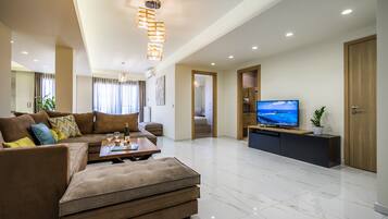 Deluxe House | Living area | TV