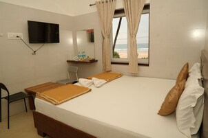 Habitación Deluxe doble, vistas al mar | Wifi gratis y ropa de cama