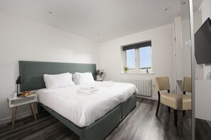 1 quarto, berço de viagem, Wi-Fi de cortesia, roupa de cama