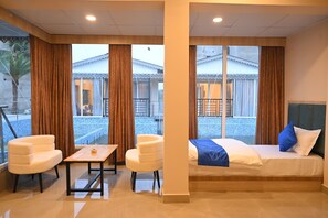 Honeymoon Cottage, Balcony, Pool View | Living area - HOTEL M PLAZA MANDARMANI (Kanthi)