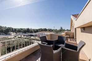 Family Quadruple Room, Partial Sea View | Terrace/patio