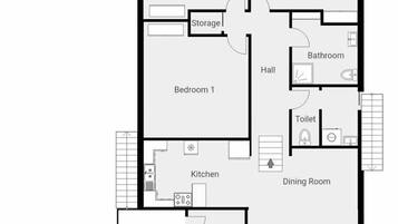 Un plan d’étage du premier étage comprenant un balcon, un salon, une cuisine, une salle à manger, trois chambres, une salle de bain, un espace de rangement et un hall d’entrée.