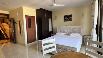 Premium bedding, desk, laptop workspace, free WiFi