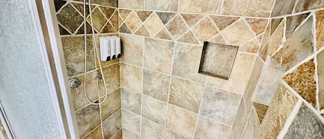 Shower, hair dryer, towels, soap