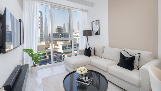 Living room - Smart and Stylish Apartment With Beautiful Views of the Burj Khalifa Down Town! (Dubai)
