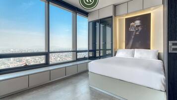 1 bedroom, desk, iron/ironing board, travel crib