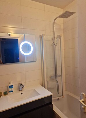 Hair dryer, towels, soap, toilet paper