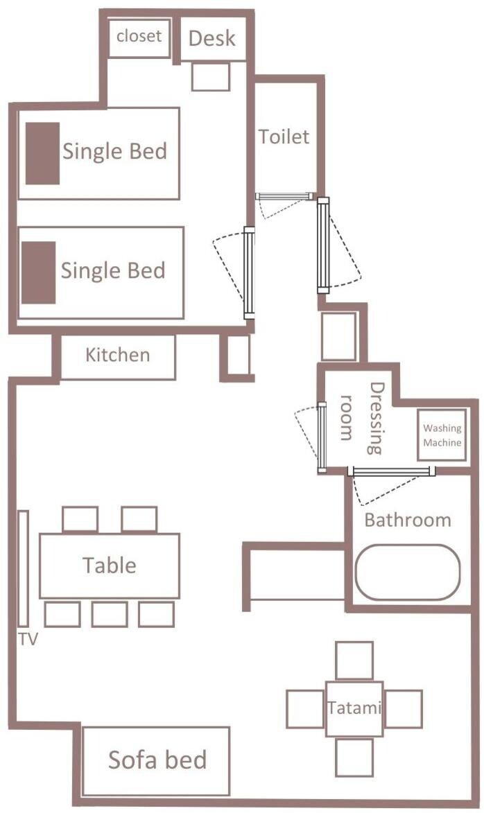 A floor plan with a single bed, a desk, a closet, a kitchen, a table, a sofa bed, a bathroom, and a tatami room.