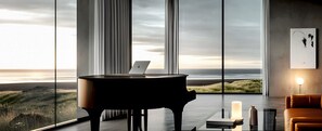 Suite Signature, vistas al mar | Zona de estar | Una televisión LCD
