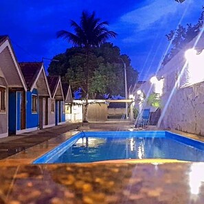 Basic Chalet, Pool View | Living area - Pousada Do Sol (Rio de Janeiro)