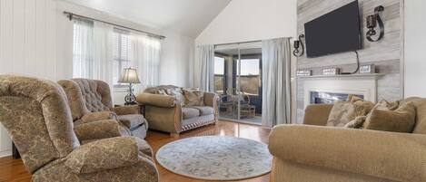 Televisión, chimenea y oficina