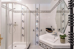 Shower, hair dryer, towels, soap