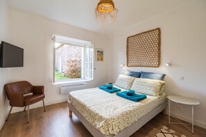 2 chambres, fer et planche à repasser, draps fournis