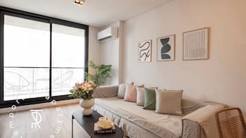 Apartamento | Área de estar | TV de tela plana 30 polegadas com canais a cabo, TV