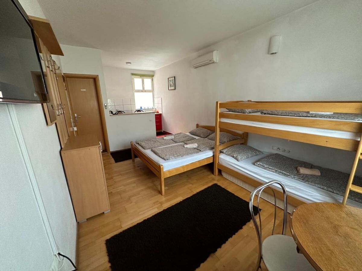 Comfort Apartment, Multiple Beds, Balcony | Living area | Flat-screen TV