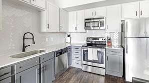 Fridge, dining tables - Landing | Amazing 2BD, Gym, Pool (Dallas)