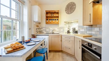 Fridge, oven, cookware/dishes/utensils