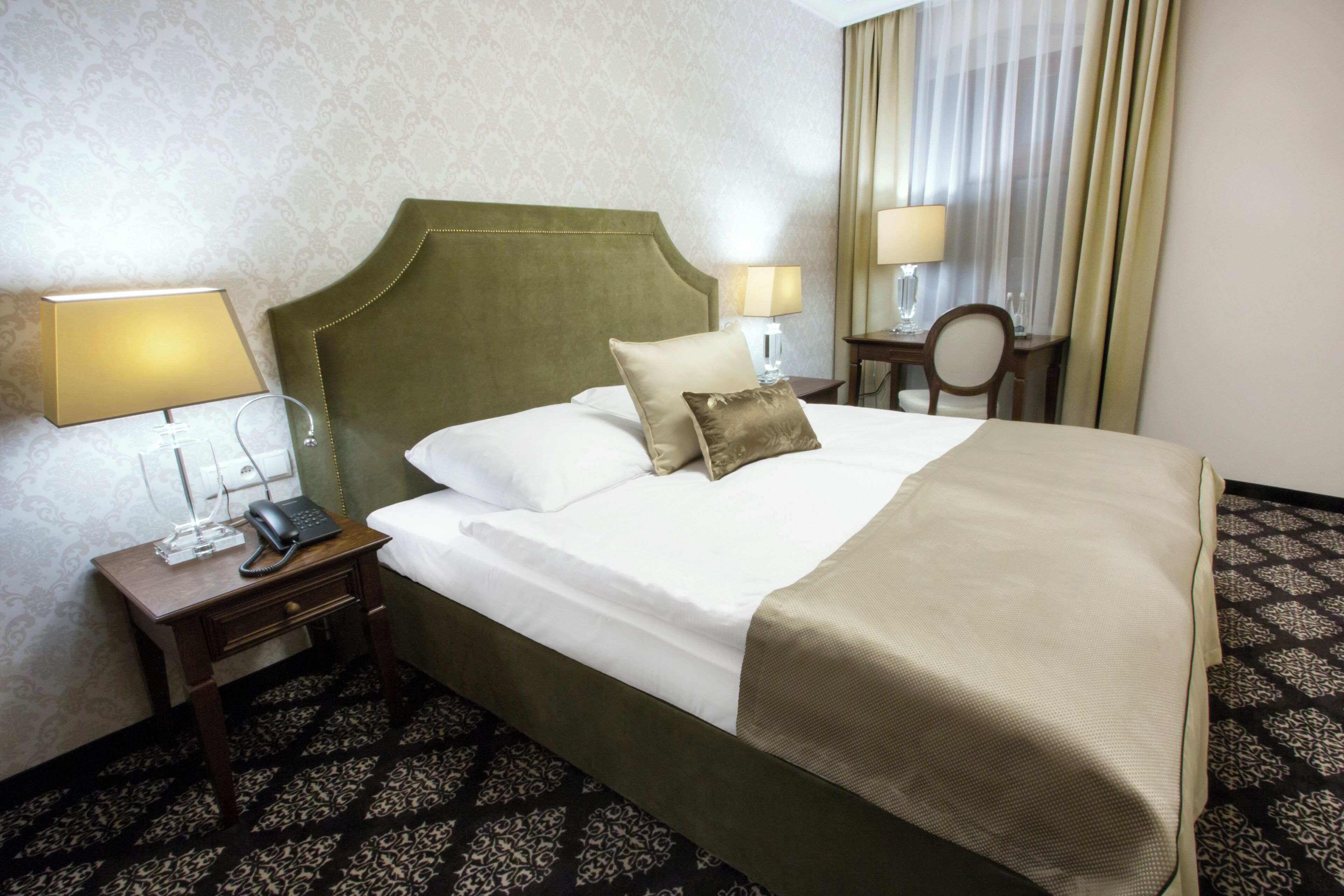 Deluxe Suite, City View | Minibar, desk, free WiFi, bed sheets