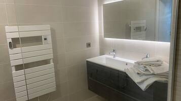 Hair dryer, towels, soap, toilet paper