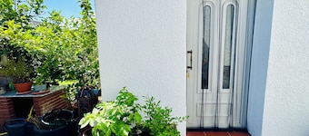 Charming apartment with air conditioning, WiFi, smart TV surrounded by greenery