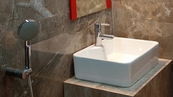 Shower, free toiletries, hair dryer, slippers