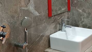 Shower, free toiletries, hair dryer, slippers