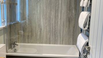 Eco-friendly toiletries, hair dryer, towels, soap