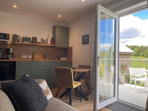 Pet-friendly luxury garden apartment surrounded by woodland and fields.