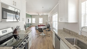 Fridge, dining tables - Landing | Stylish 2BD, Gym, Clubhouse (Huntsville)