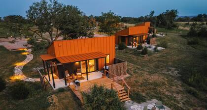 Luxury cabin in the center of the Texas Wine Country; large private porch w/hot tub, gas grill and fire pit; pet friendly