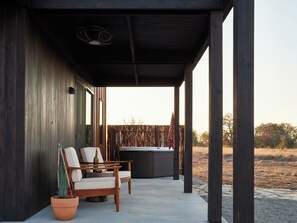 Terrace/patio - Luxury cabin in the center of the Texas Wine Country; large private porch w/hot tub, gas grill and fire pit; pet friendly (Stonewall)