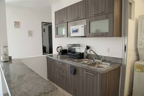 Private kitchen - Cozy three-room apartment (Cancun)