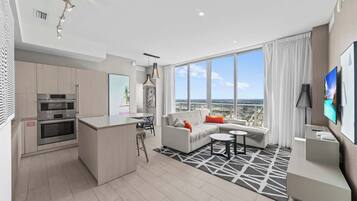 Condo, Multiple Beds, Hot Tub, Ocean View (Unparalleled Atlantic Penthouse) | Living area | 50-inch flat-screen TV with digital channels