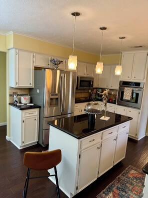 Private kitchen - The Crown Jewel is a cozy home with many gorgeous features and cozy aspects. (Lufkin)
