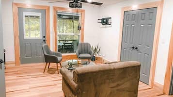 Smart TV, fireplace, books, offices