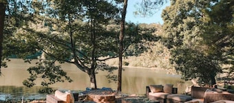 Two lakefront cabins next door