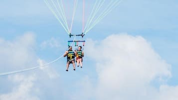 A parachute with a smiling face design, used for skydiving.