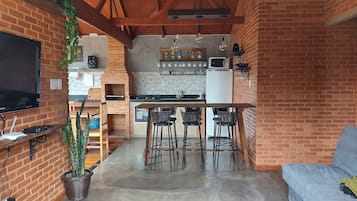 Basic Chalet | Living area | 42-inch LCD TV with cable channels, fireplace, MP3 dock