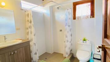Shower, hair dryer, towels, soap