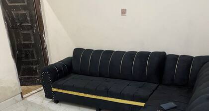 Charming 1-bedroom apartment in beautiful Faisalabad with living room terace