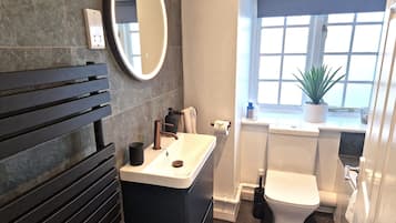 Hair dryer, towels, soap, shampoo