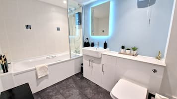Hair dryer, towels, soap, shampoo