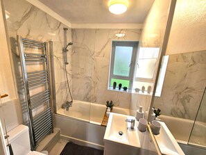 Hair dryer, towels, soap, toilet paper