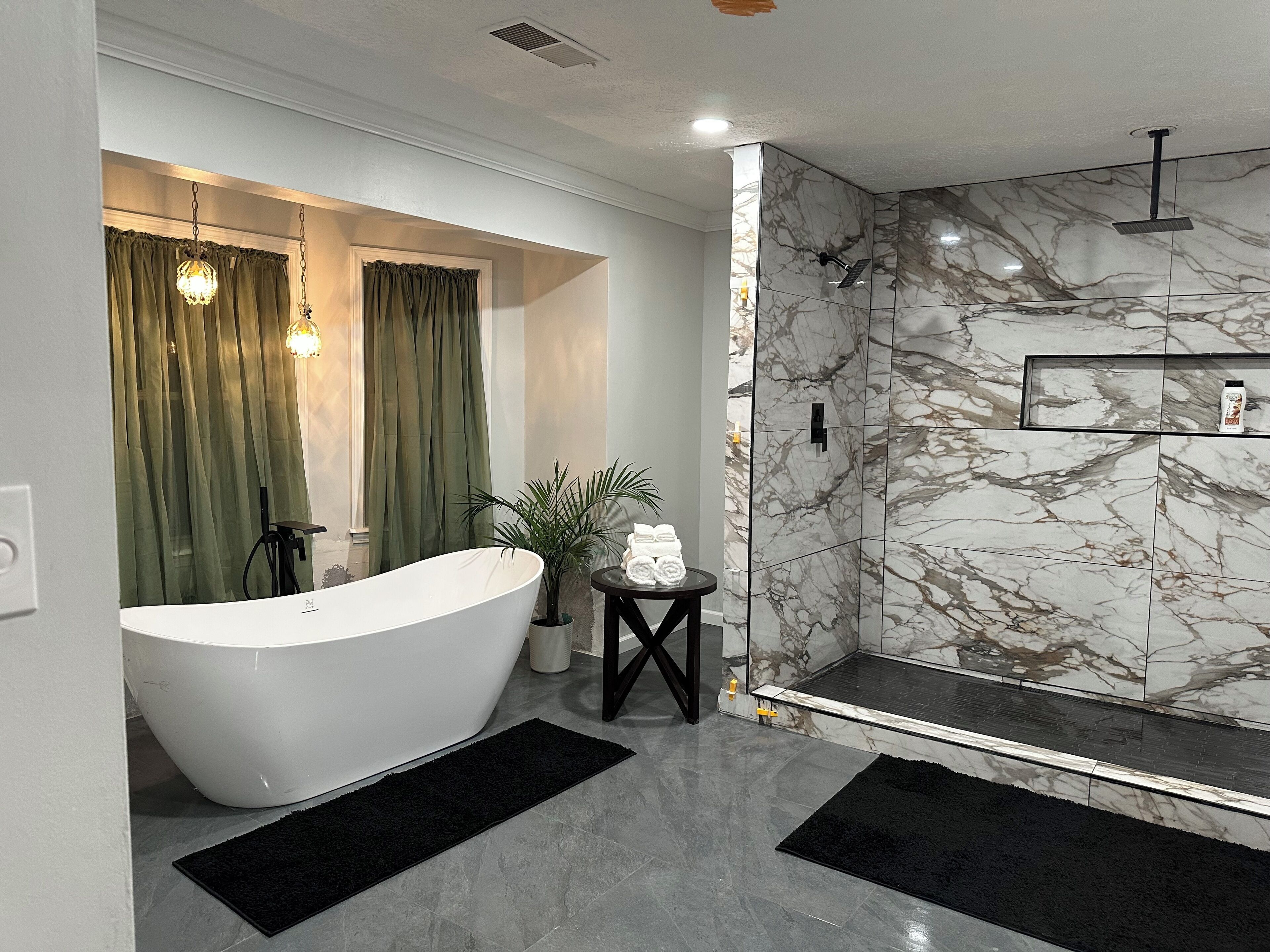 Shower, jetted bath, towels, soap