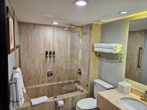 A modern bathroom with a glass-enclosed shower, a toilet, a sink, and a towel rack. - Not Available (Cabo San Lucas)
