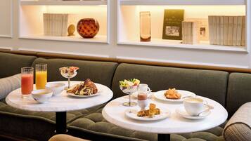 Daily buffet breakfast (EUR 23 per person)