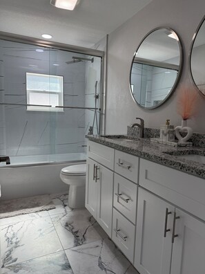 Hair dryer, towels, soap, shampoo