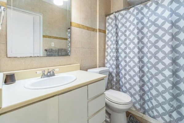 Hair dryer, towels, soap, toilet paper