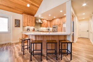 Fridge, microwave, oven, stovetop - Venture in Tahoe Donner by Tahoe Getaways - 4 BR 3.5 BA Hot Tub, Pool Table, Great for Kids! (Truckee)